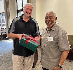 Fr. Jeff Duaime (Congregational 1st Assistant) is thanked by Gary Warner (Lay Spiritan)